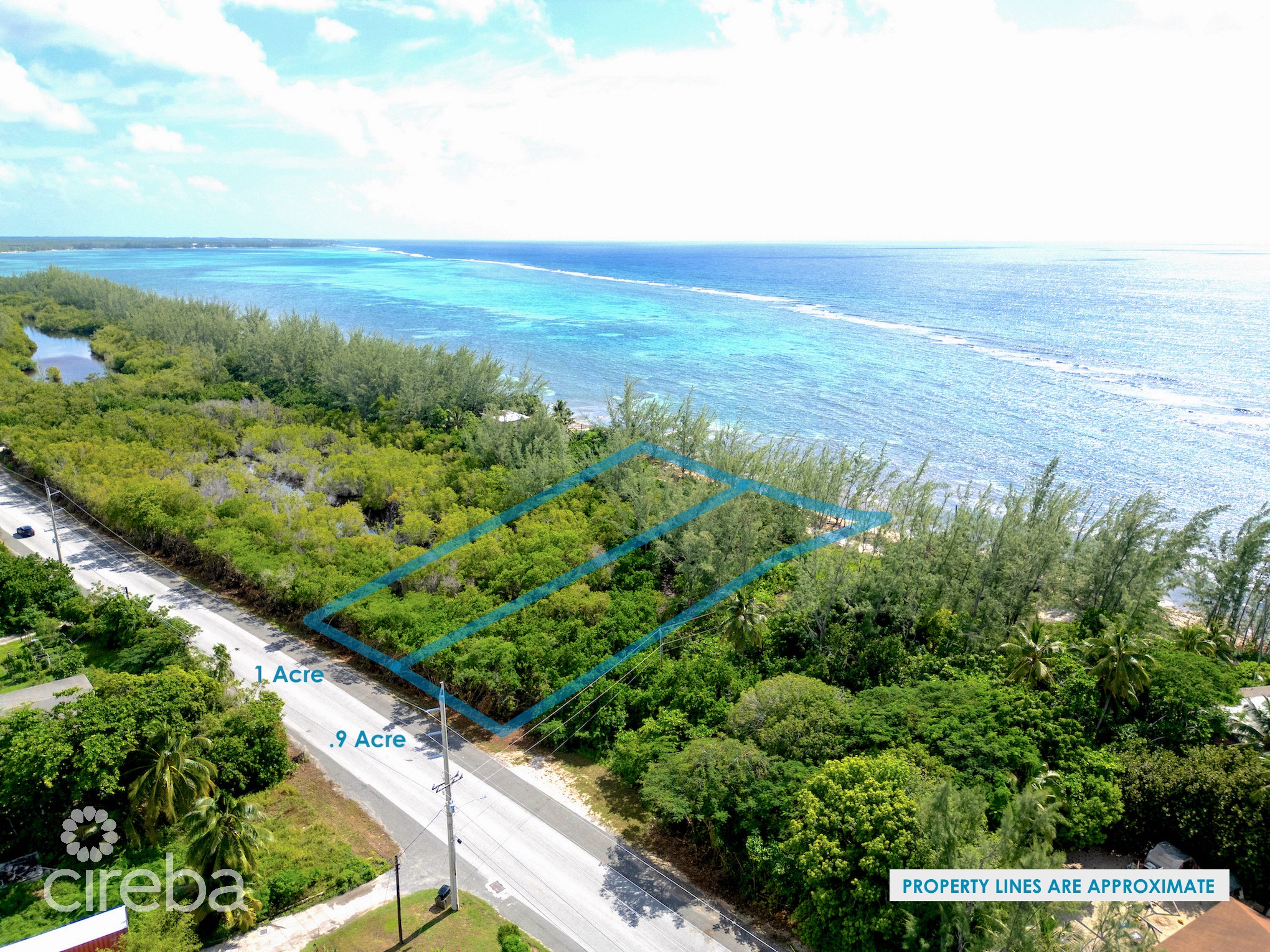 TRANQUIL BEACHFRONT ACRE PARCEL- REEF PROTECTED WITH WHITE SAND