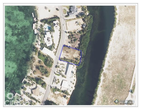 CAYMAN KAI CANAL FRONT LOT W/ APPROVED PLANS – WATER CAY ROAD