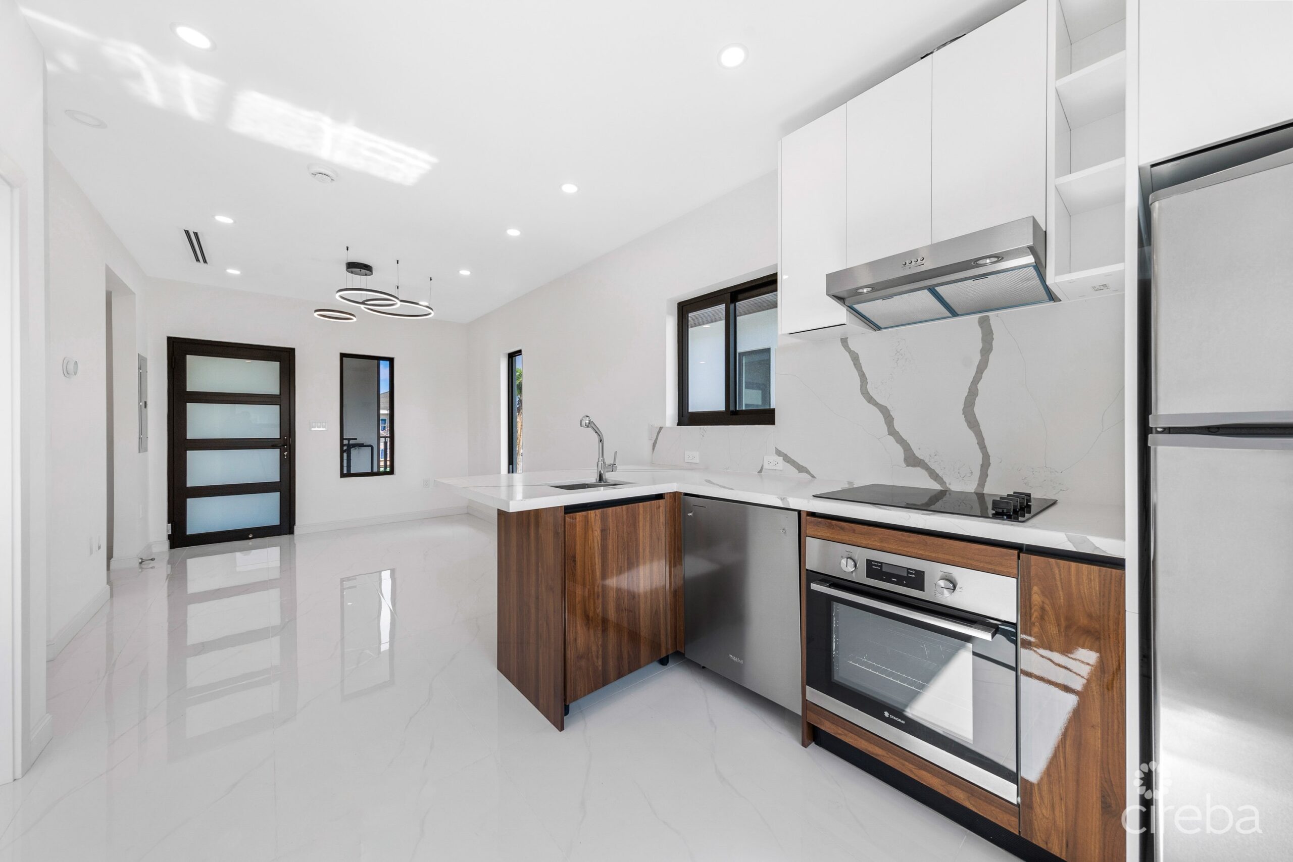 ARZA WEST BAY J5. 1-BED END UNIT – INCLUSIVE OF A CI$ 14,000 FURNITURE PACKAGE. MOVE-IN READY