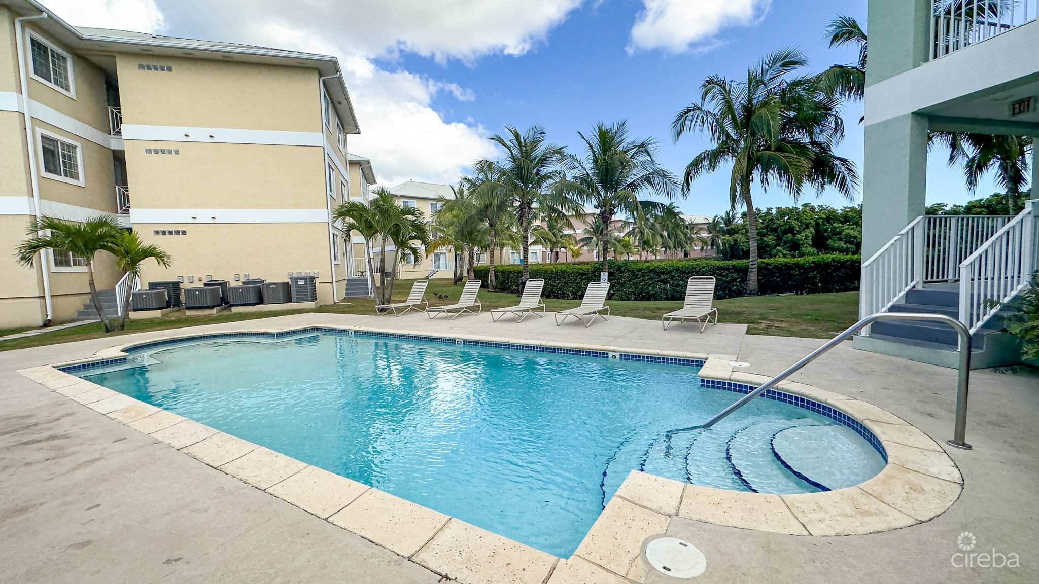 LAKESIDE CONDO NEAR CAMANA BAY