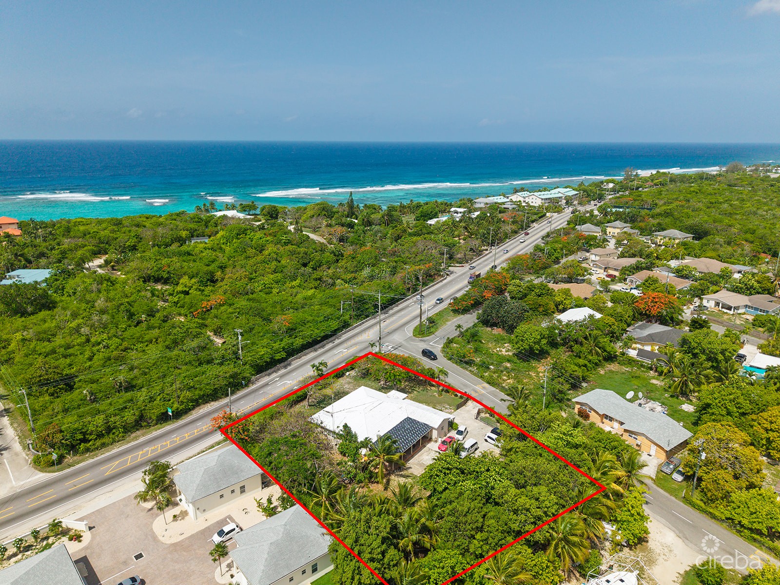 RE-DEVELOPMENT OPPORTUNITY – FIXER UPPER ON .70 ACRES