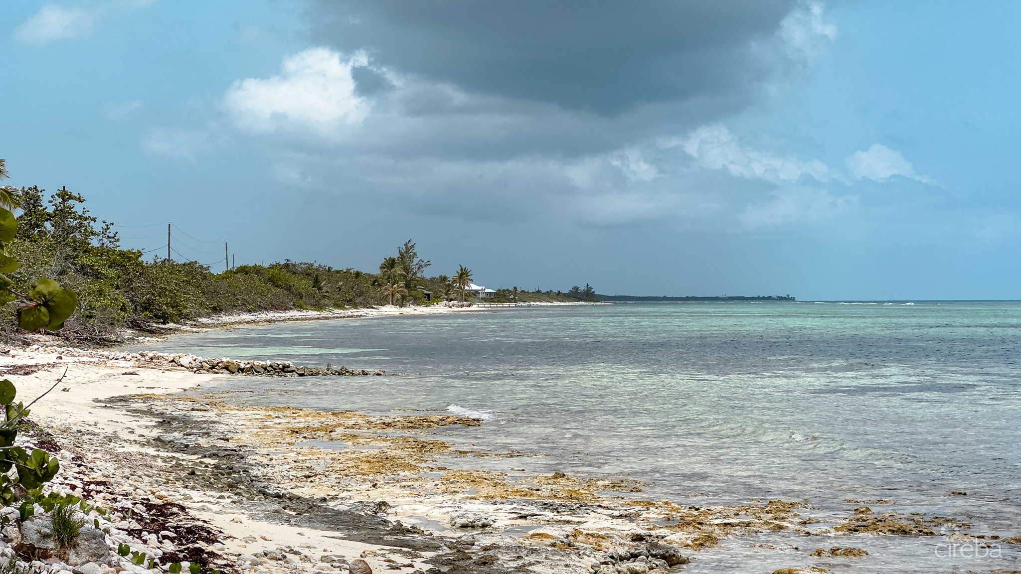 LITTLE CAYMAN OCEAN VIEW RESIDENTIAL HOME WITH BEACHFRONT LOT