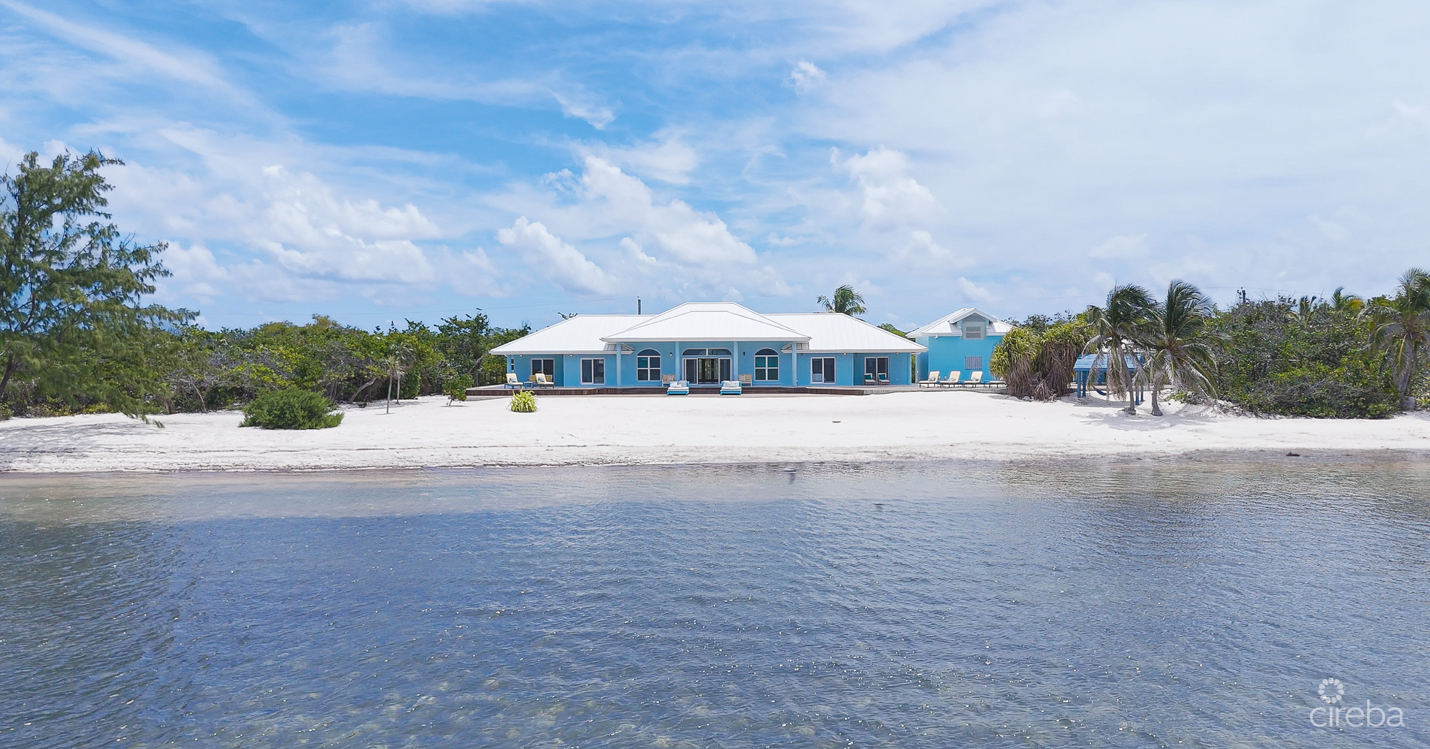 LITTLE CAYMAN BEACHFRONT HOME WITH 2 LOTS AND POOL