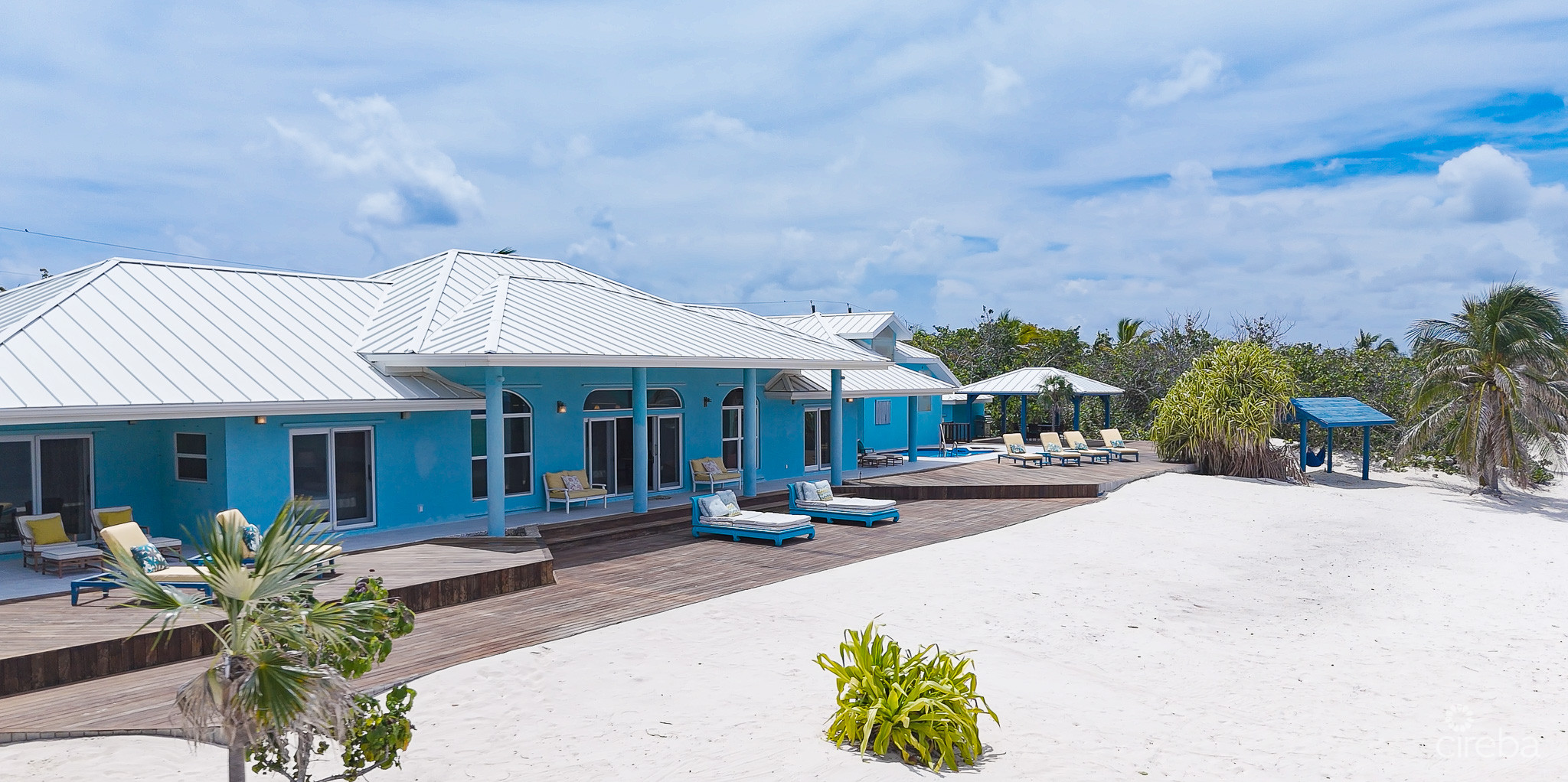 LITTLE CAYMAN BEACHFRONT HOME WITH 2 LOTS AND POOL