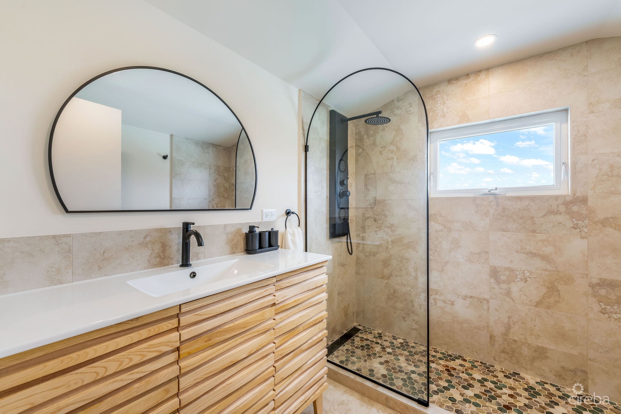 SUPERB VALUE AND VIEWS ON SPOTTS BEACH – 15 CORAL BAY VILLAGE