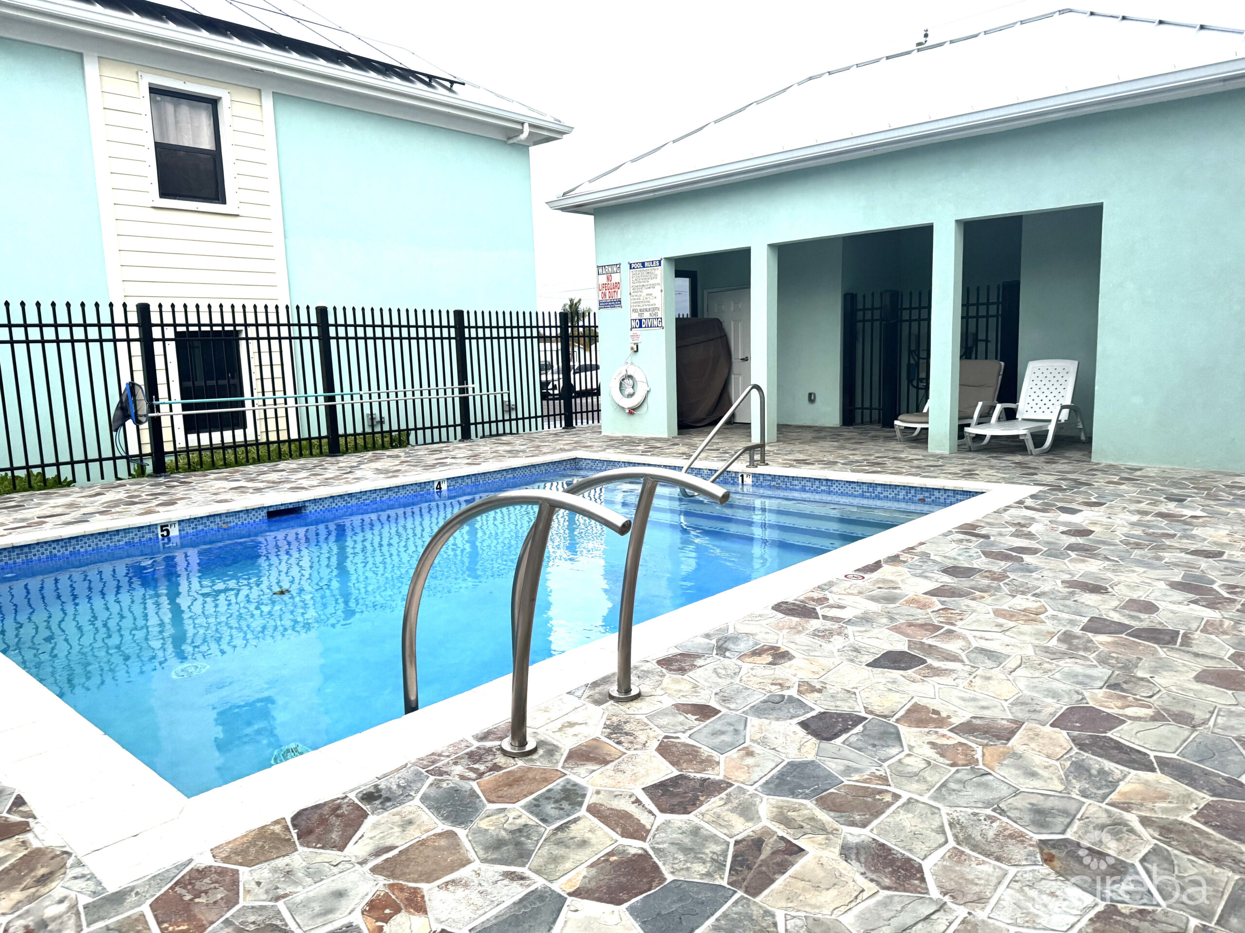 INCOME-PRODUCING RESIDENTIAL PORTFOLIO –4 STUDIOS IN WEST BAY