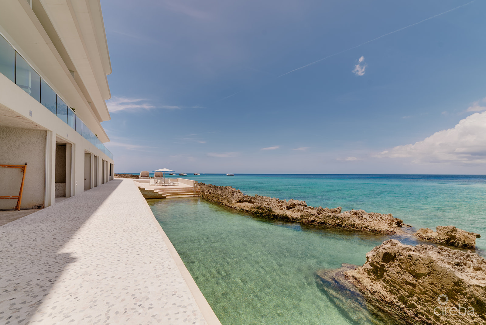 THREE-LEVEL OCEANFRONT FIN PENTHOUSE  #30 PLUS 2 GARAGES