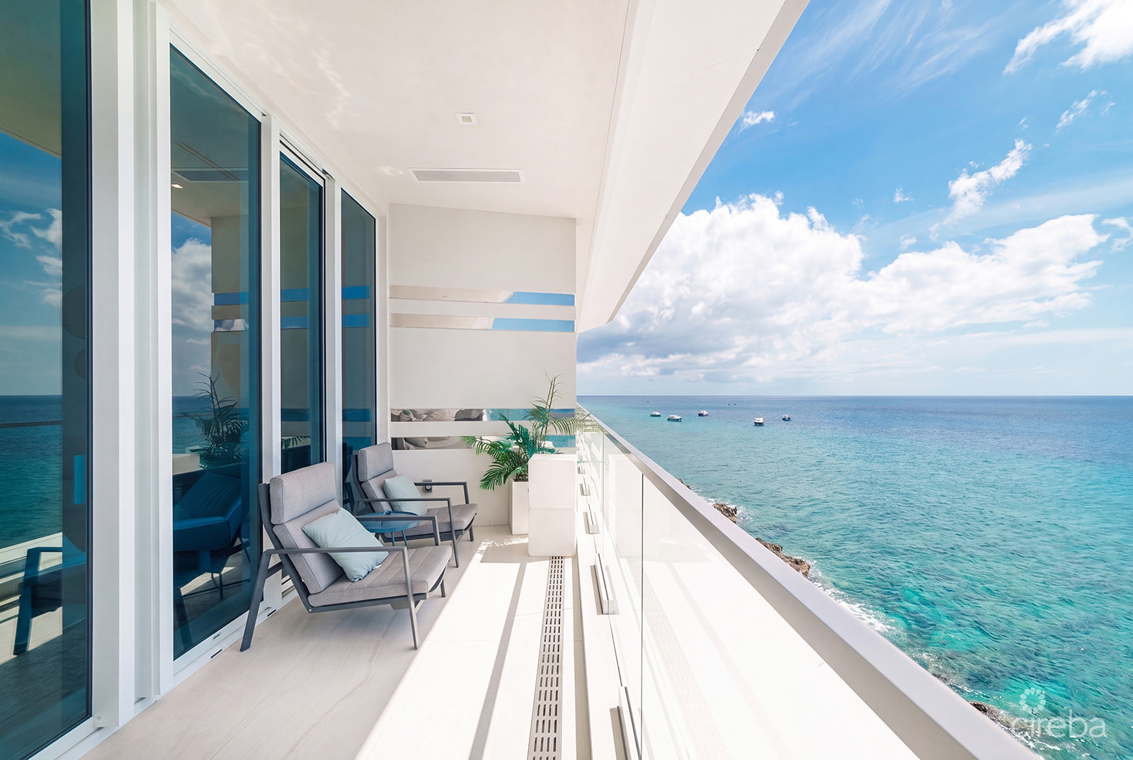 THREE-LEVEL OCEANFRONT FIN PENTHOUSE  #30 PLUS 2 GARAGES