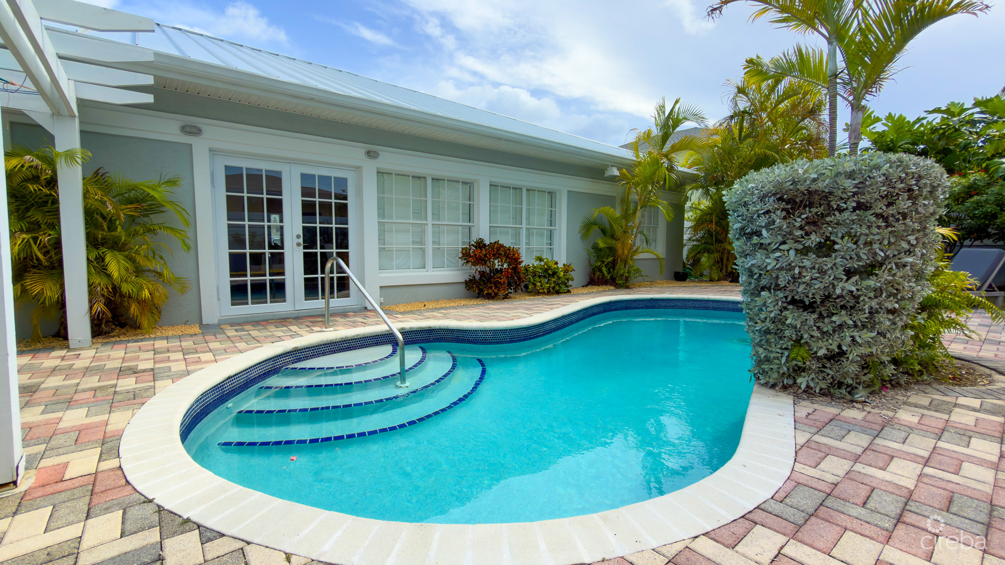 SNUG HARBOUR ANDREW DRIVE – 4 BEDROOM FAMILY HOME IN THE SEVEN MILE BEACH CORRIDOR