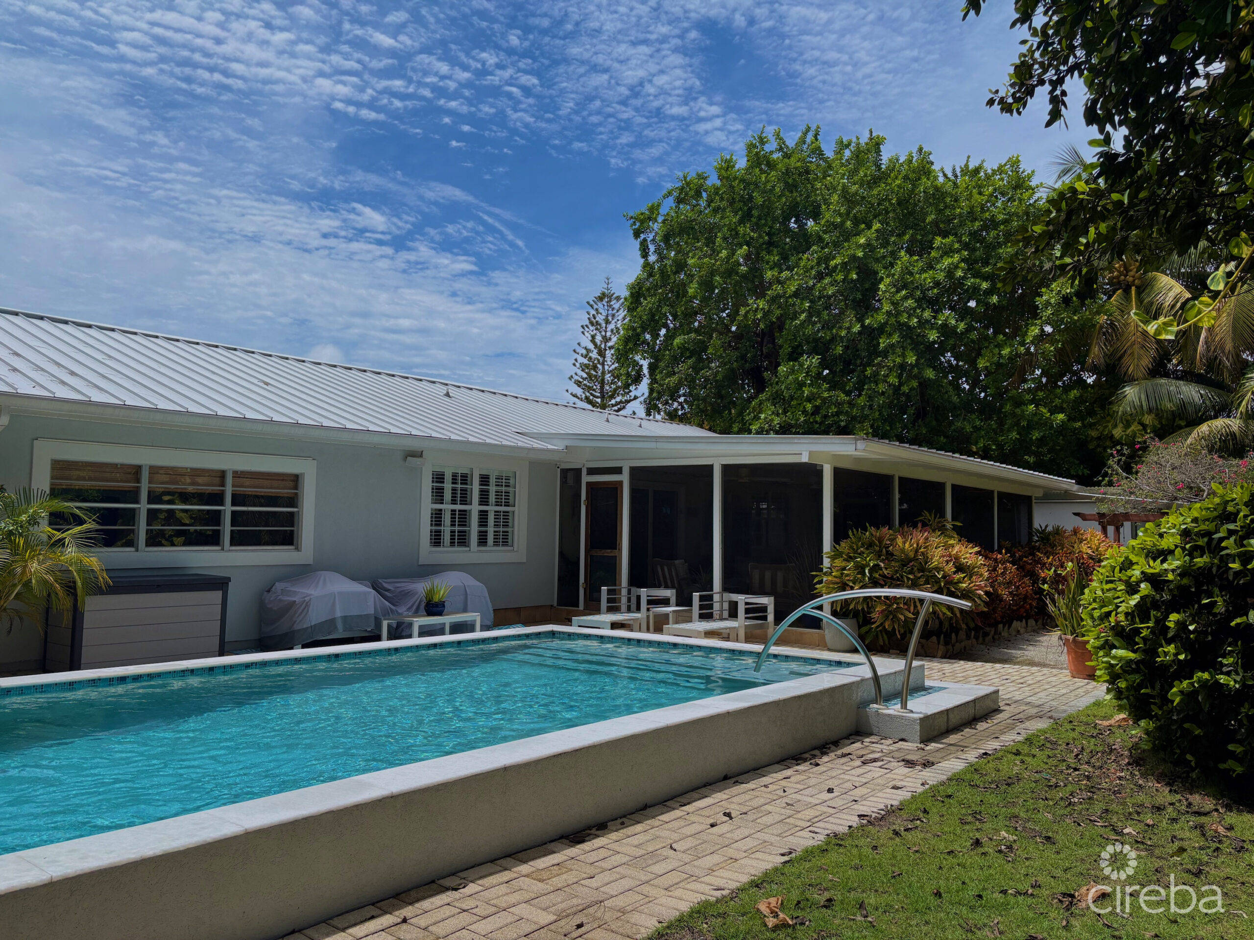 RARE DOUBLE-LOT OASIS BUNGALOW  WITH POOL IN SNUG HARBOUR