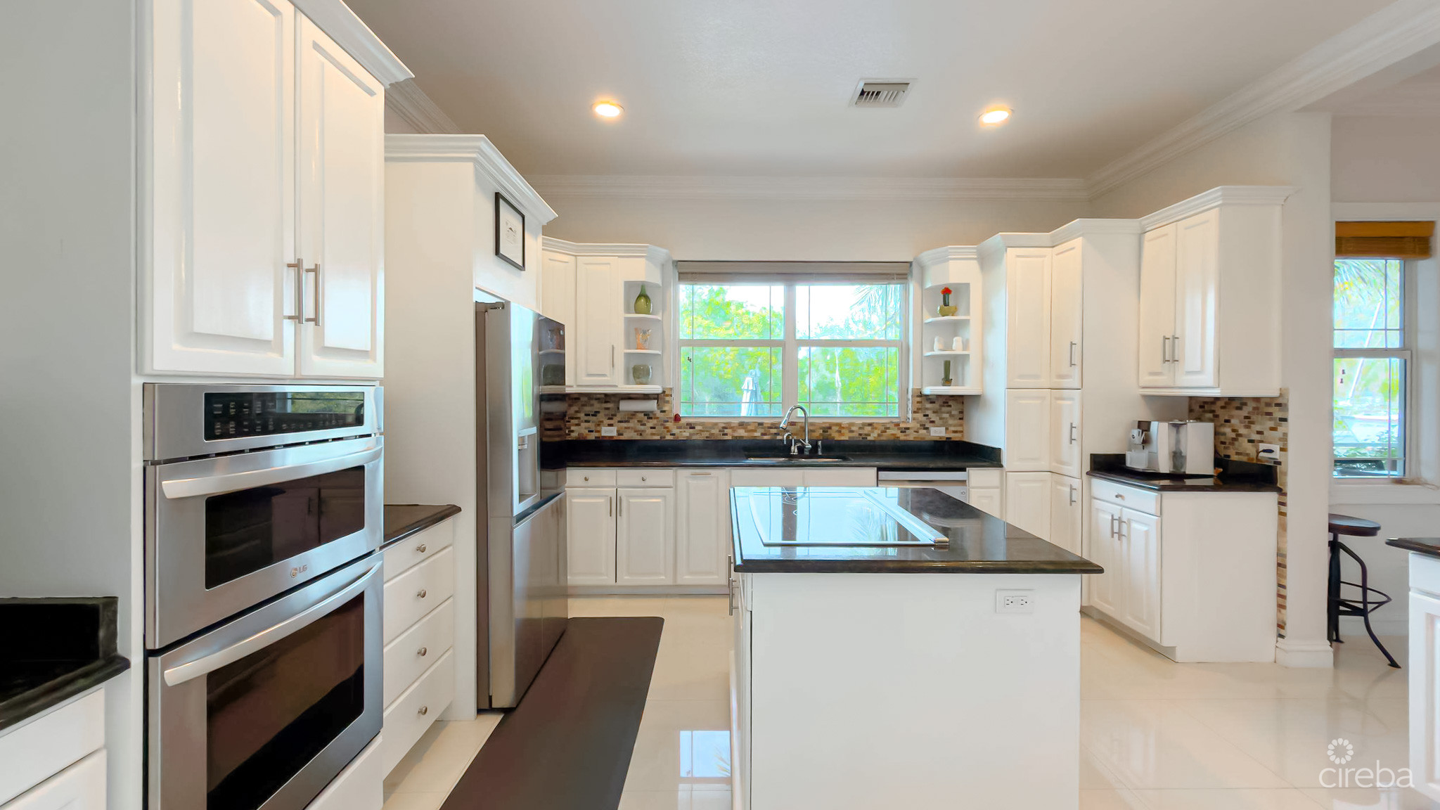 SUN ROSE CANAL FRONT HOME – NORTH SOUND ESTATES